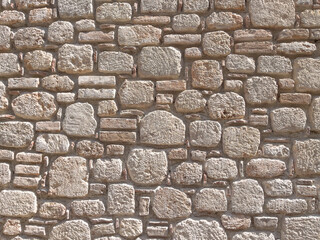 Textured old house stone wall background. Stonewall background or texture.