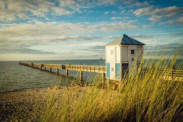 Lubmin seaside pier house at sunset. Baltic sea shore, Germany