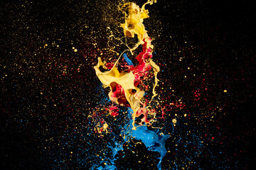 abstract liquid color splash on black background