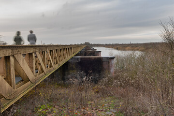 Old abandoned train railway bridge moerputtenbrug in The Netherlands