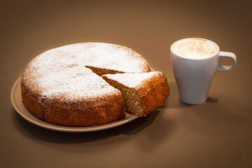 An old recipe Italian cake made of almonds and dry bread with cappuccino (Antica torta alle mandorle e pane)