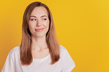 Close-up of a woman cunning face smile look side empty space