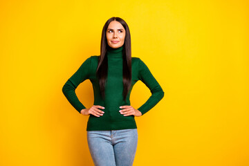 Photo of nice optimistic brunette long hairdo lady look empty space wear green sweater isolated on bright yellow color background