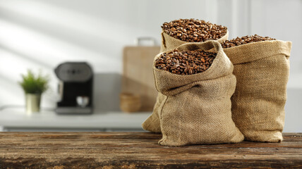 Fresh coffee in sack and kitchen interior 