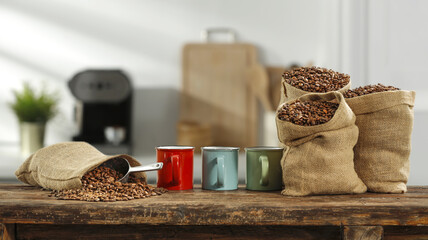 Fresh coffee in sack and kitchen interior 