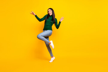 Fototapeta na wymiar Full size photo of young happy cheerful good mood girl dancing look copyspace isolated on yellow color background