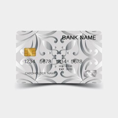 Credit card. With silver elements desing. And inspiration from abstract. On white background. Glossy plastic style. 