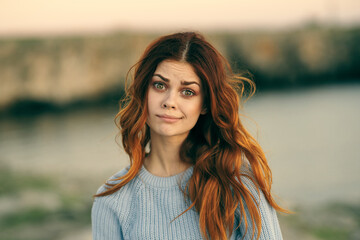 pretty red-haired woman island travel vacation tourism