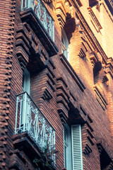 Red brick building facade in Buenos Aires