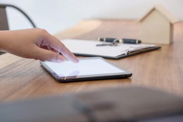 Fototapeta premium Business people signing contract making deal with real estate agent Concept for consultant and home insurance.Real estate investment Property insurance and security. Real estate agent offer house.
