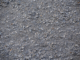 a lot of gray gravel. Gray background