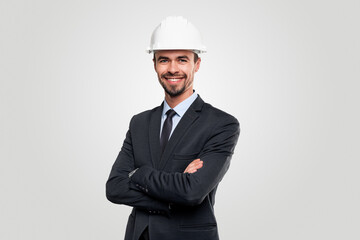Smiling engineer in suit and helmet