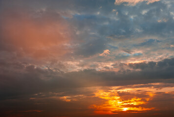 Beautiful sunset sky, yellow clouds