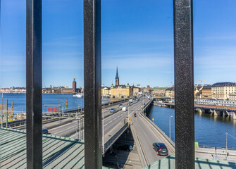 View onto old town in Stockholm through iron fence