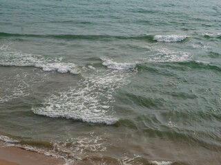 Detail of waves on a cloudy day