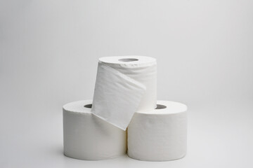 Toilet paper roll isolated on white background.Snow-white soft three-layer toilet paper. Lack hygiene products. Primary protection and disinfection. Crisis product lack concept.