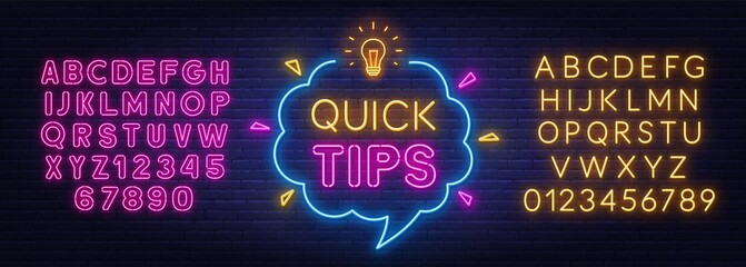 Quick Tips neon sign on brick wall background.