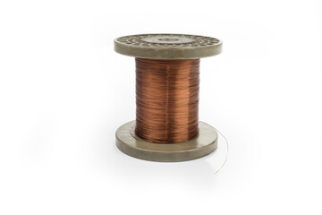 Copper wire on a reel on a white background