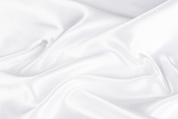 Abstract white silk fabric texture background. Cloth soft wave. Creases of satin