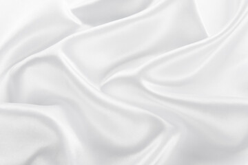Abstract white silk fabric texture background. Cloth soft wave. Creases of satin