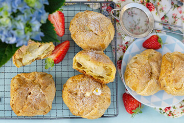 Sweet puffs of choux pastry and custard cream