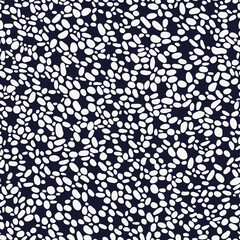 Dot Artwork Seamless Repeat Pattern. Vector circles random placed all over print on dark blue background.