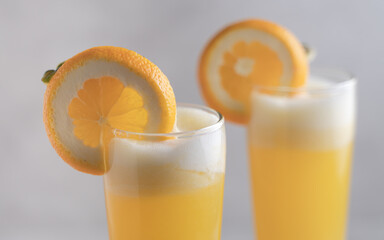 Refreshing freshly made fruit juice on a glass , Fresh Orange juice