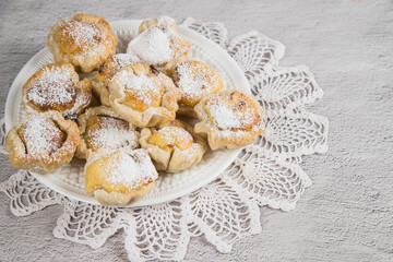 Traditional Portuguese homemade puff pastry with egg cream. Dessert Pasteis de nata.