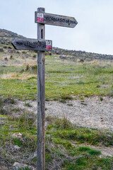 Wooden signpost with an arrow