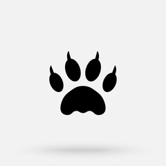 illustration. Tiger paw prints logo. Black on white background. Animal paw print with claws. © studiographicmh