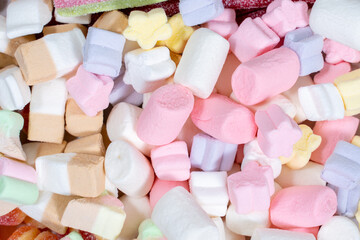many colored marshmallows. candy background. a lot of sweet snacks.