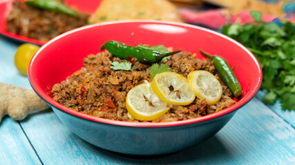 Qeema karahi with vegetable roghni naan India and Pakistan food 