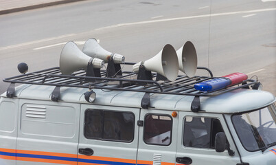 car with loudspeaker, public alert, coronavirus, national emergency alert