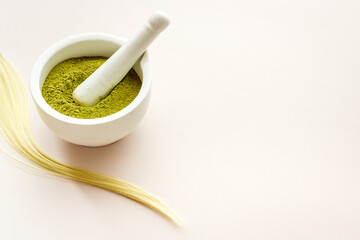 Herbal henna or mehandi powder for hair coloring or tattoo on hands