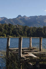 Fototapeta na wymiar landscape of mountains and lake near Bariloche with a pier t