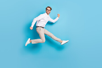 Fototapeta na wymiar Full body profile side photo of happy cheerful young man run sale good mood isolated on blue color background