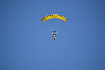 paragliding in the blue sky