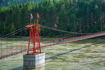 Fototapeta na wymiar Suspension bridge over the Katun River