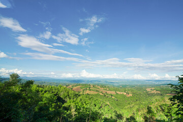 Fototapeta na wymiar panorama of beautiful countryside of Phu Ruea, Loei,Thailand, sunny afternoon. wonderful springtime landscape in mountains. grassy field and rolling hills. rural scenery.