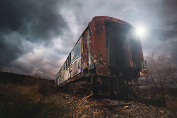Naklejka na ściany i meble Angle shot of a train car at dusk