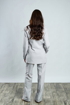 back of business woman in suit