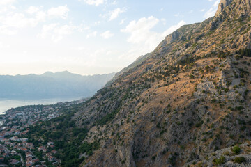 Fototapeta na wymiar A view of a rocky mountain and Kotor Bay in Montenegro
