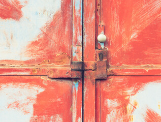 Doorway with stained obsolete paint and interesting locking homemade system