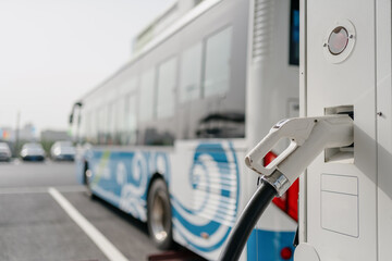 bus is charging in power station - obrazy, fototapety, plakaty