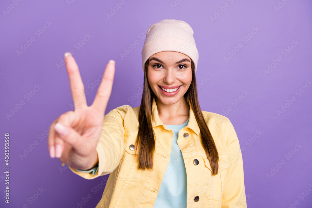 Sticker photo portrait of pretty woman in stylish clothes showing v-sign gesture happy smiling isolated viol