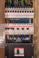 Electrical panel with different wires. Current control cabinet for various devices