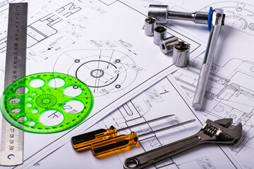 Several Technical engineering drawings, which show mechanical parts engineering components and assemblies for their manufacture in industry. Factory Industrial work project blueprints measuring tools