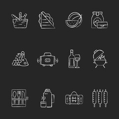 Picnic chalk white icons set on black background. Heaving picnic hamper. Ham and cheese sandwich. Watermelon. Take away food. Wireless loudspeaker. Isolated vector chalkboard illustrations