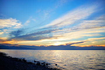Obraz premium Beautiful landscape of Lake Baikal. Sunset in summer . 