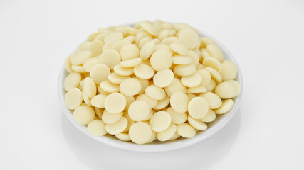 white chocolate chips isolated on white background, top view